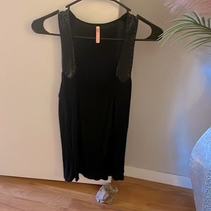 Cute black tank with detail.